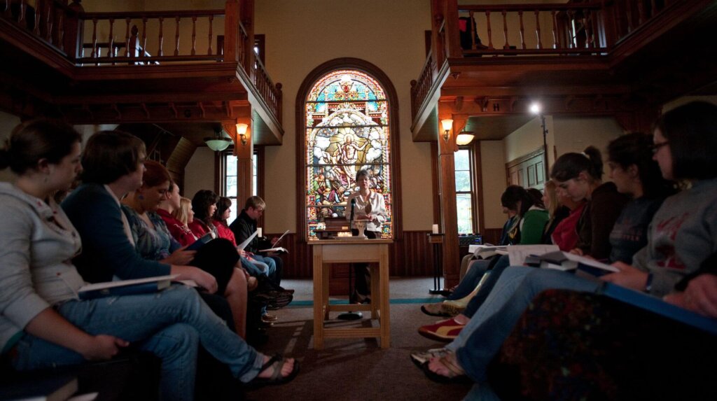 Photo of the inside of the Chapel with students seated