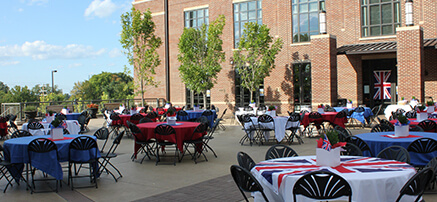 Clayton Center plaza with tables set before ballet performance