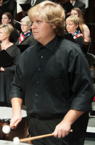 student playing the Timpani