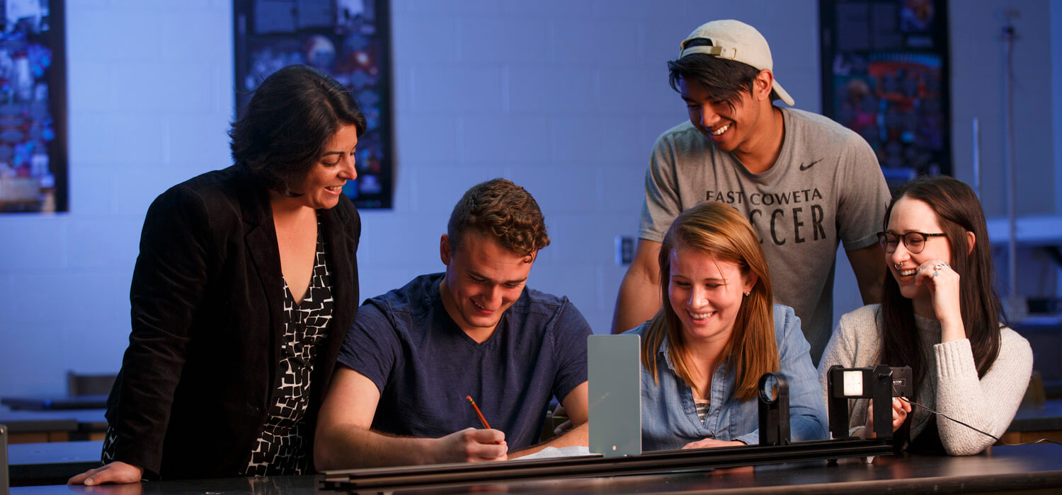 photo of engineering students in classroom with professor
