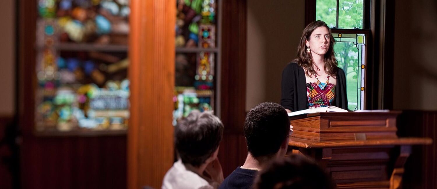 student giving a lesson in campus chapel