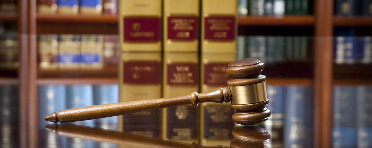 Photo of gavel and law books representing criminal justice major/minor.