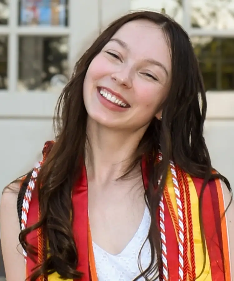 Photo of alumna Emily Huffstetler who graduated with a degree in Spanish, Design, and Writing Communication.