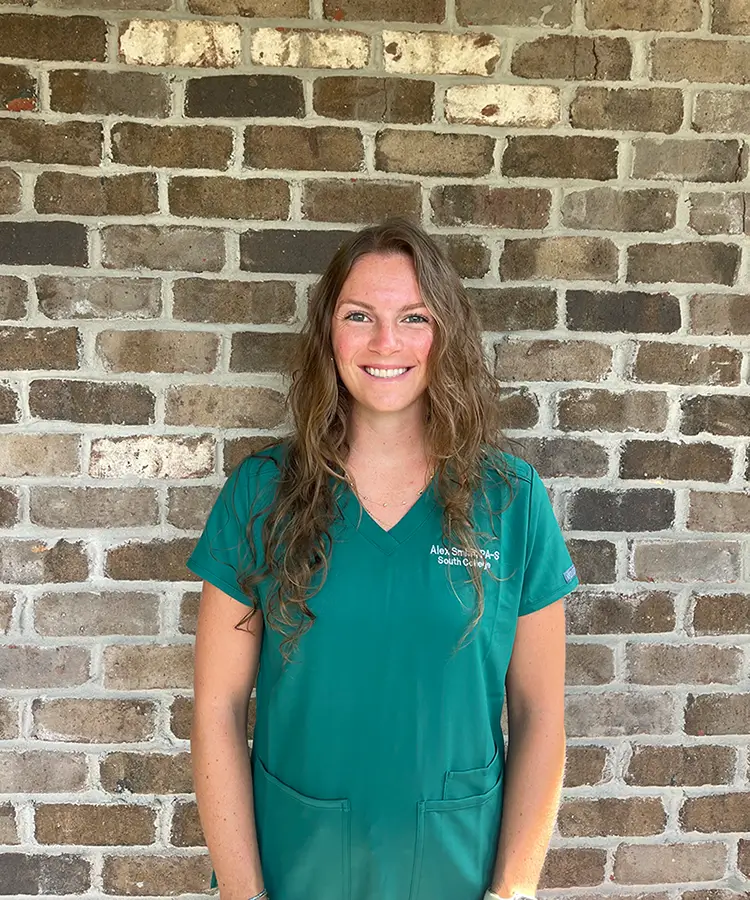 Photo of alumna Alex Smith who graduated with a degree in biology on the pre-physician assistant track.