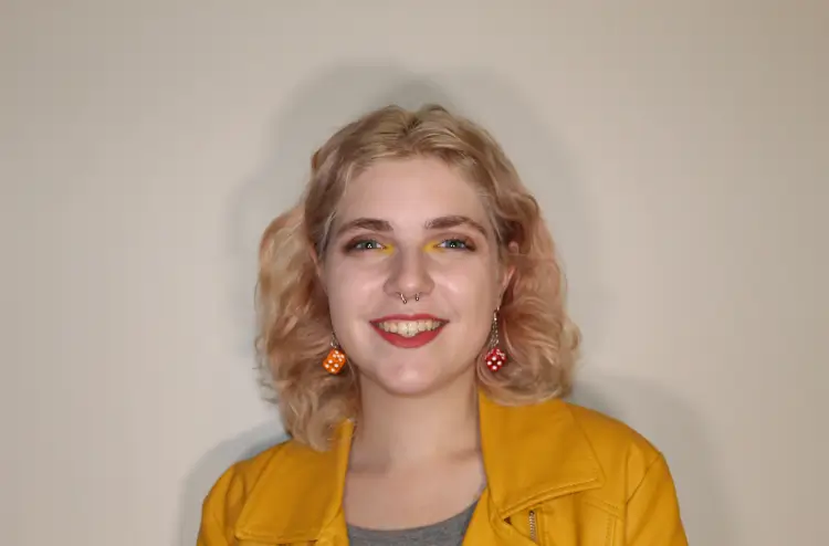 Photo of alumni Jenni Cates Rhodes who recently graduated with a degree in Theatre.