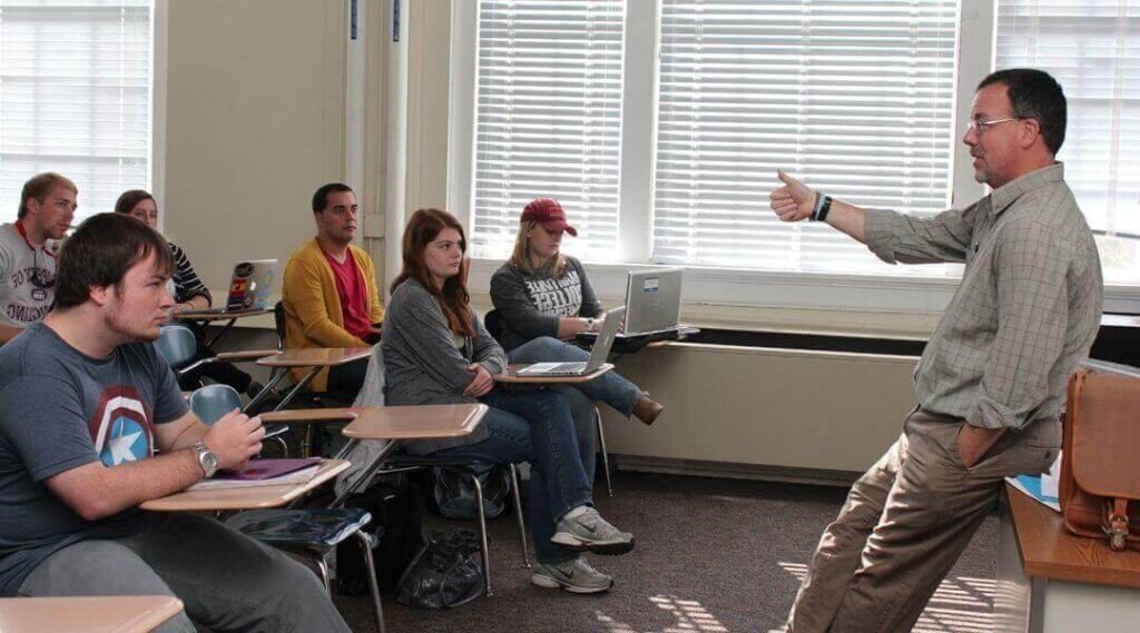 MC professor in front of class