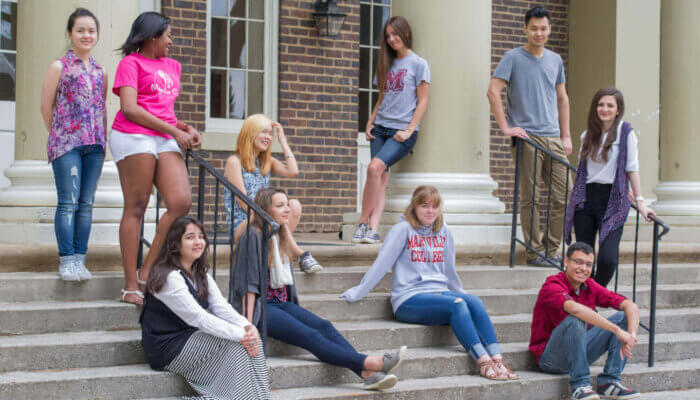international students on the dinning hall steps