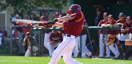 Photo of a MC baseball player swinging at the ball