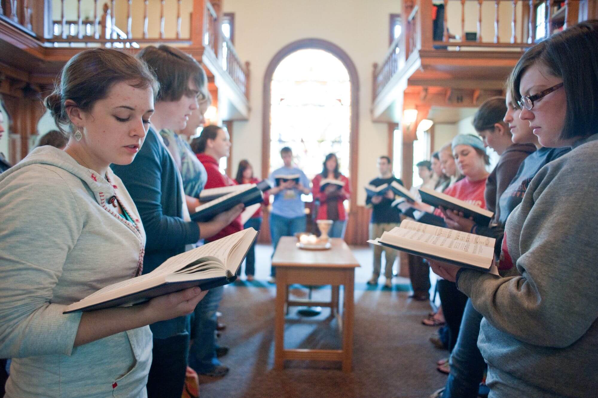 MC students singing from hymnal