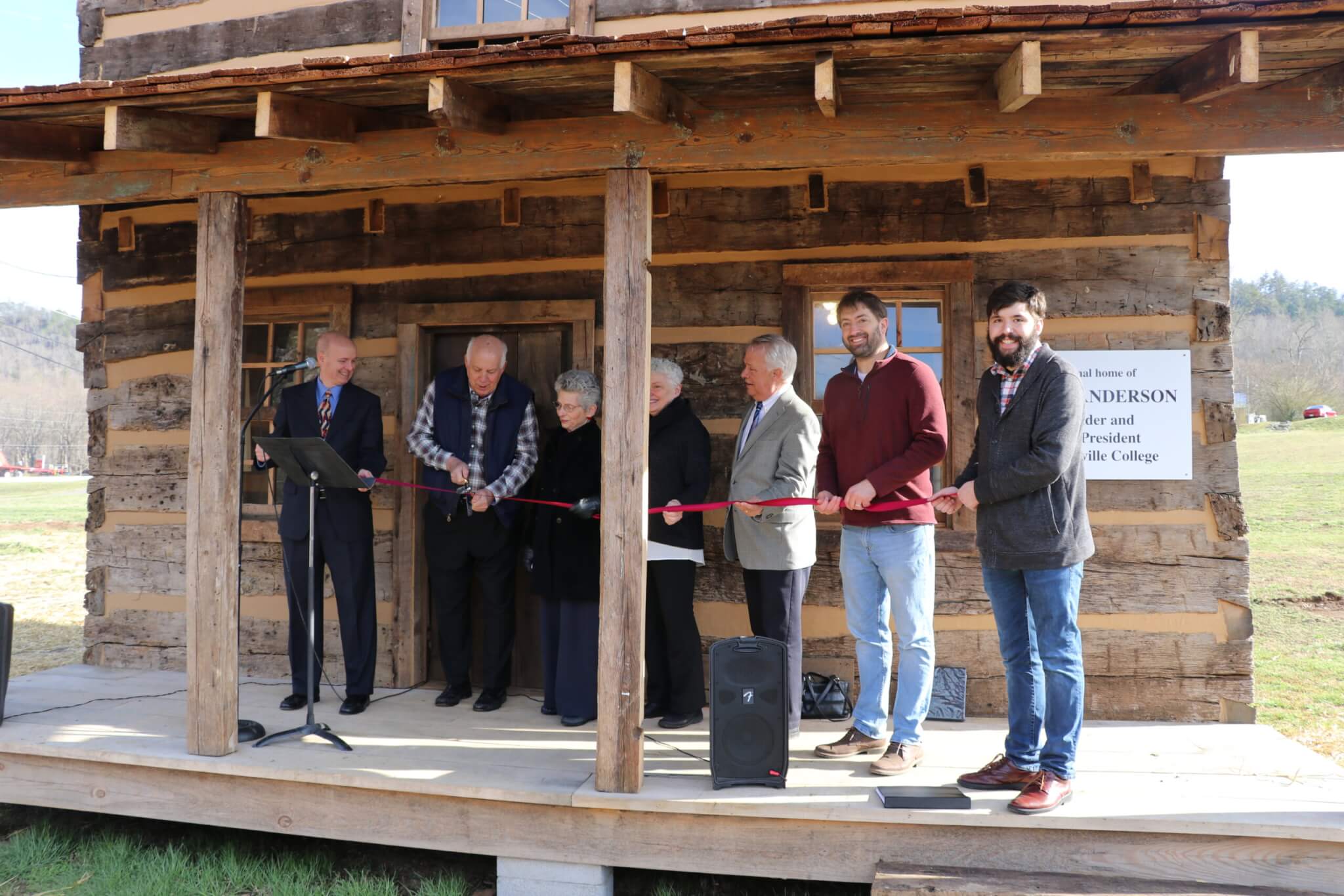Photo of Isaac Anderson Cabin ribbon cutting