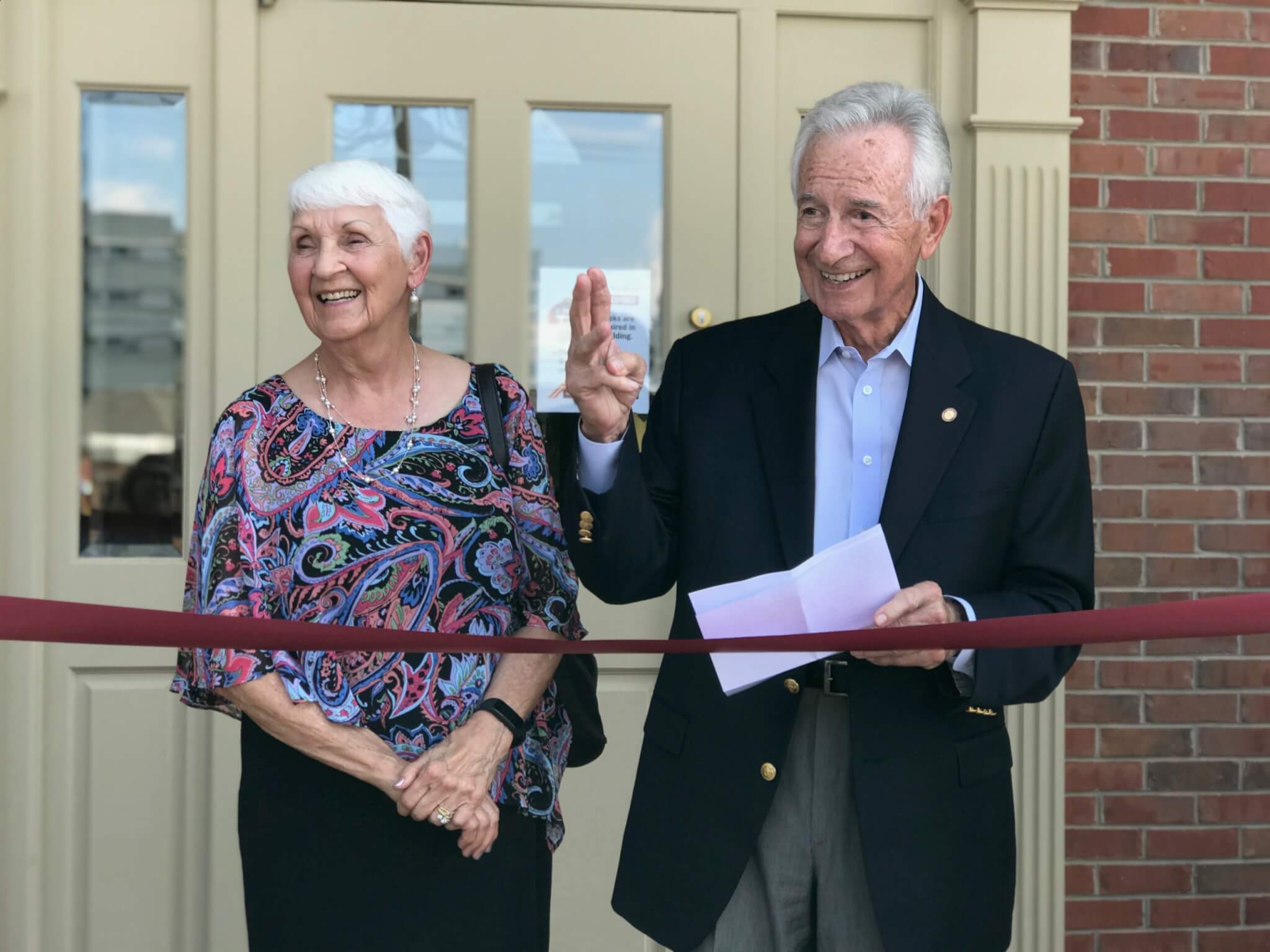Photo of Dan and Shirley Greaser giving remarks