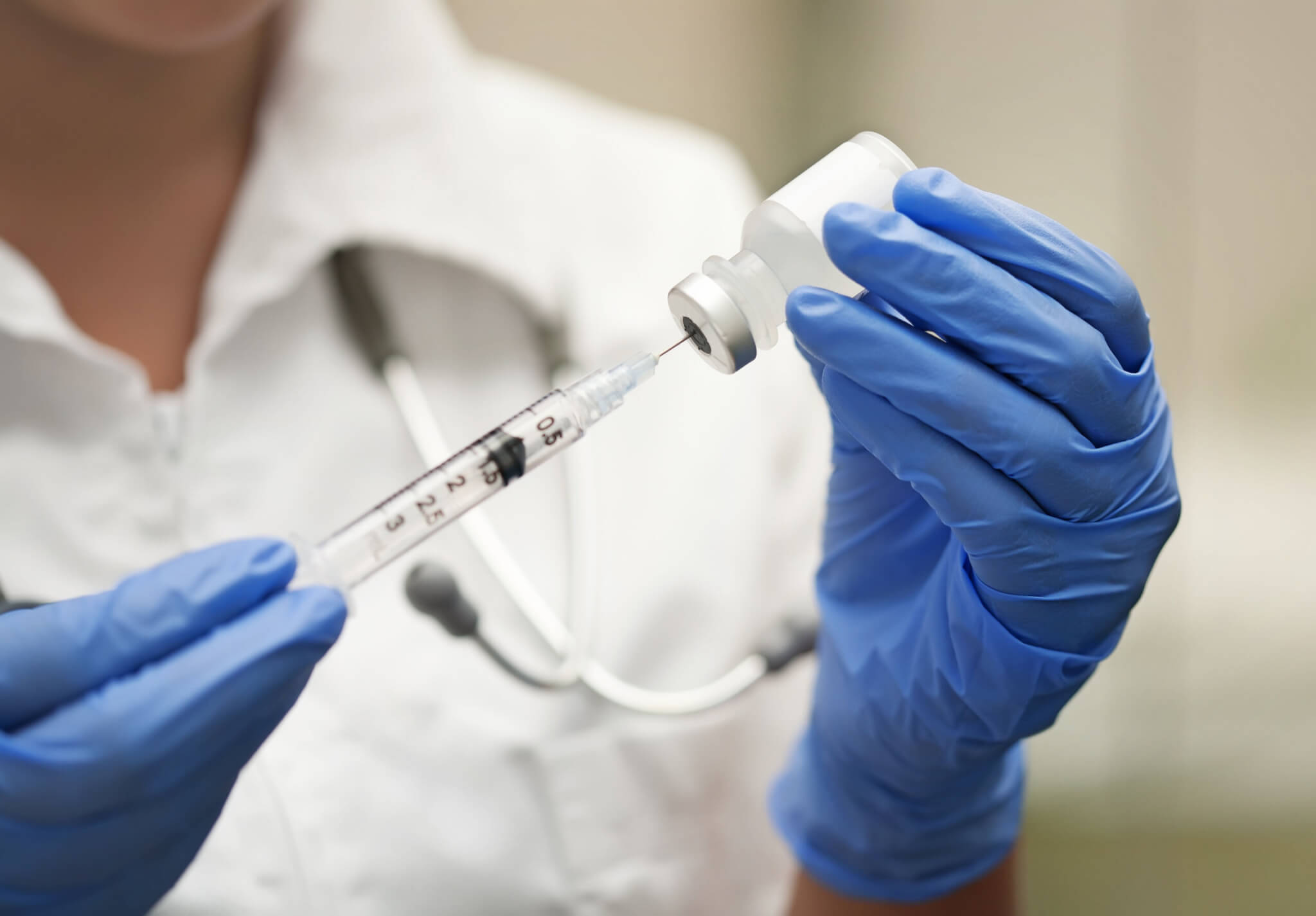 Photo of person and vaccine