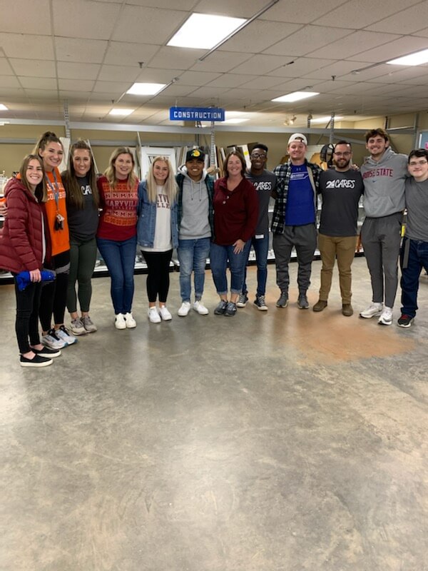 Photo of class volunteering at Habitat for Humanity ReStore