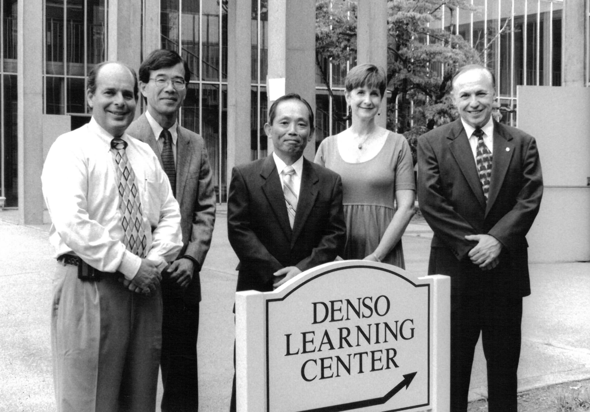 President Gibson and Vandy Kemp with executives from DENSO