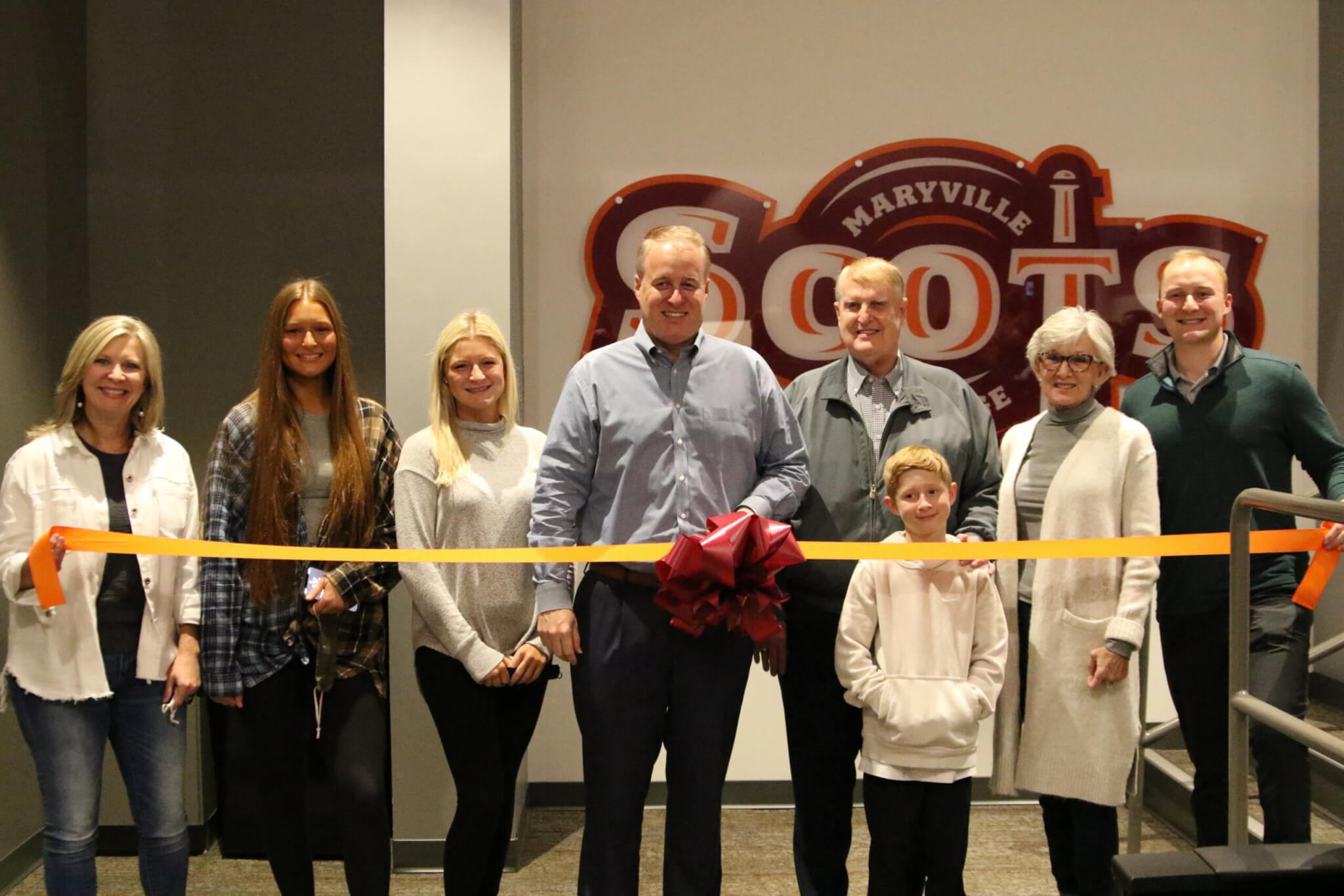 Photo of Carruthers family during ribbon cutting