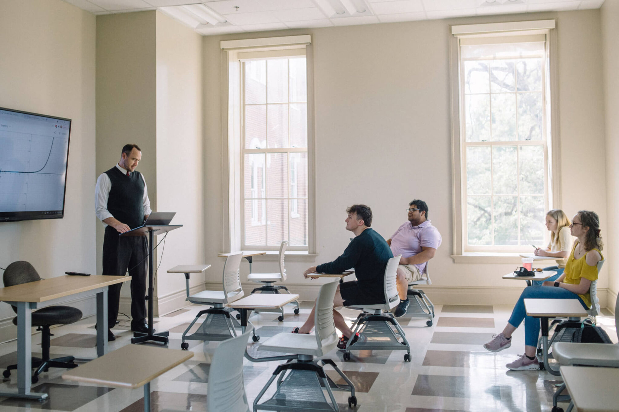 Photo of professor and students in classroom