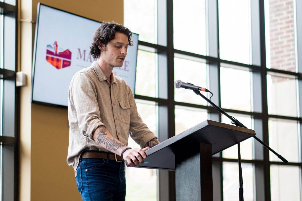 Photo of Ryan Indelicato at podium