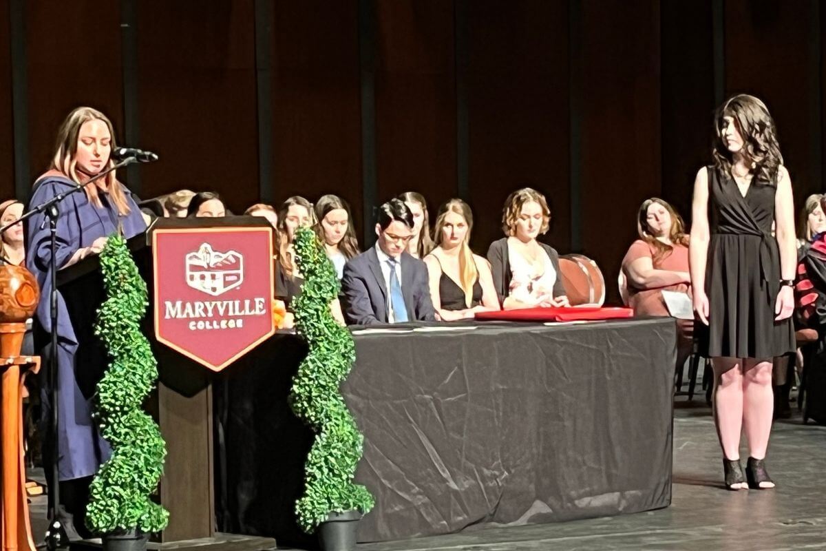 Photo of faculty member and student