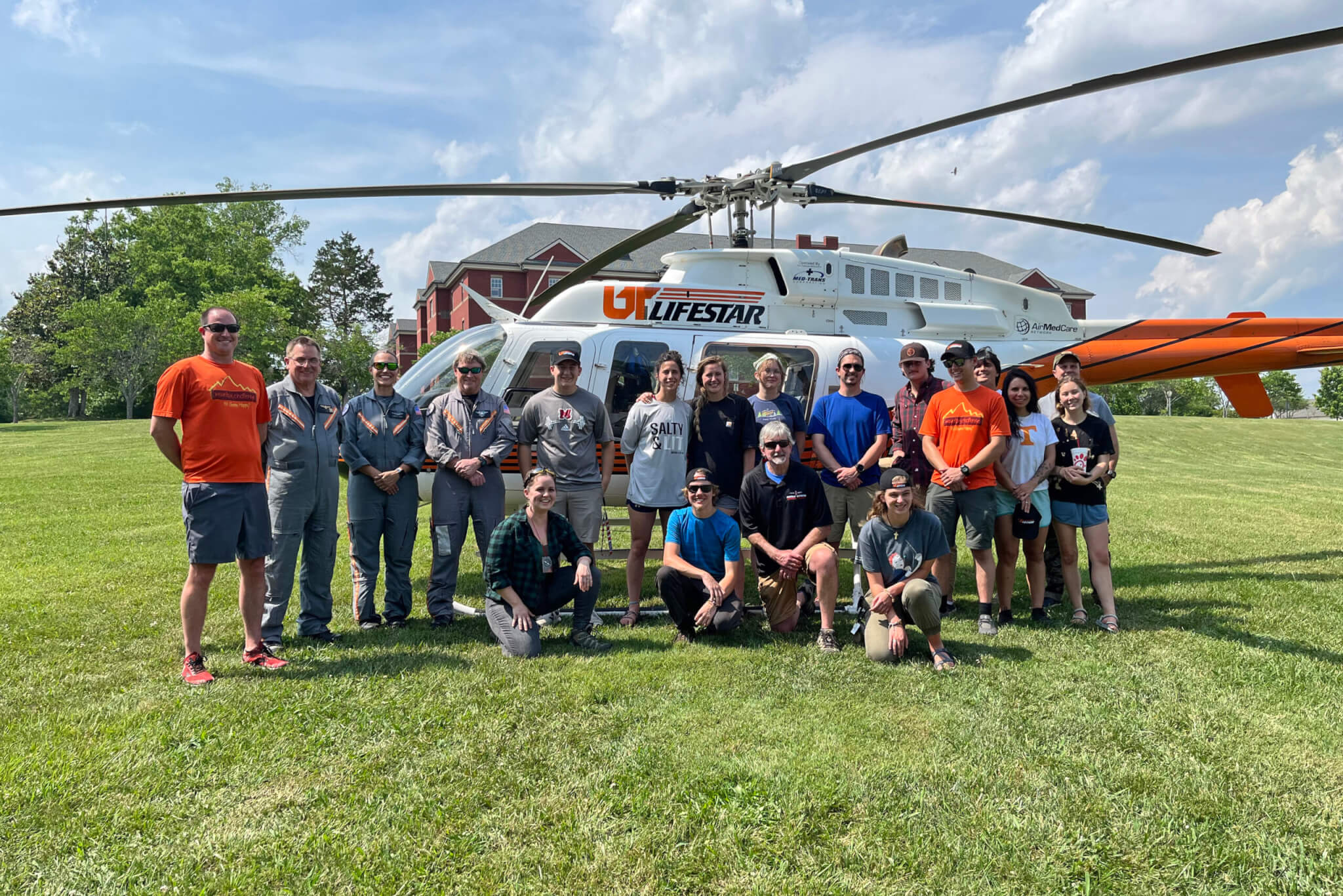 Photo of class with UT LIFESTAR helicopter