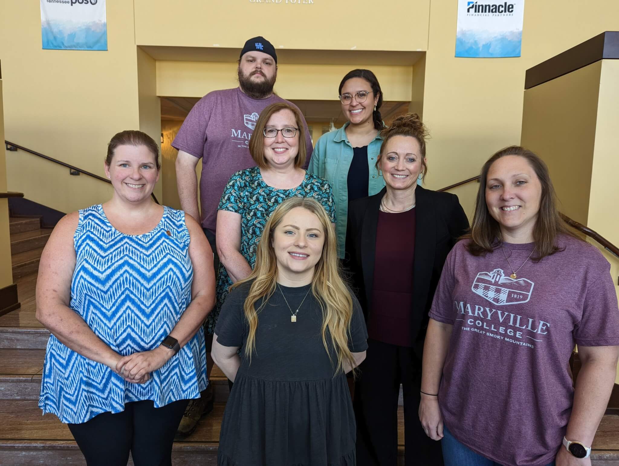 Photo of staff members being recognized