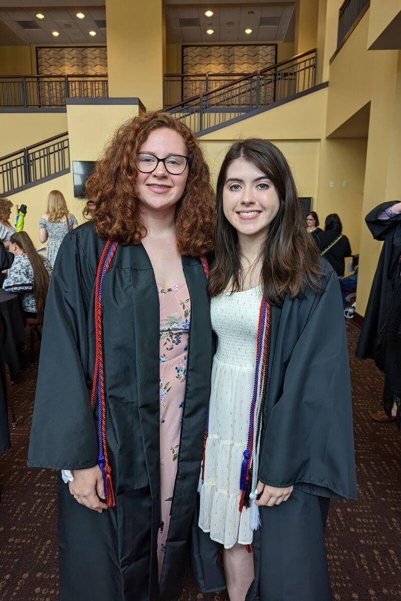 Photo of two smiling students