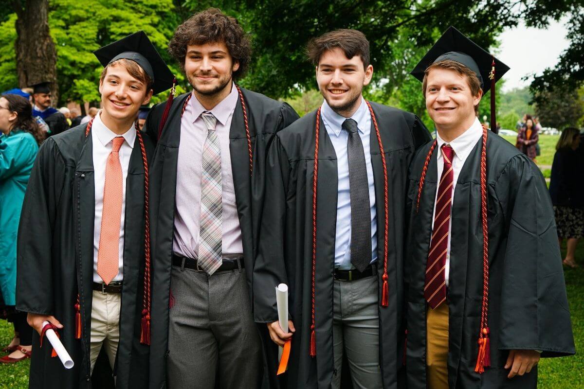 Photos of four male graduates