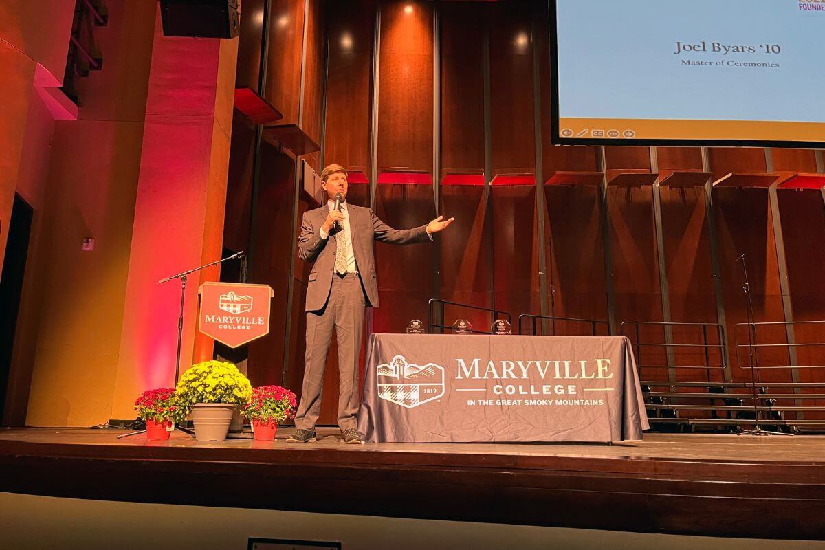 Photo of comedian Joel Byars on stage