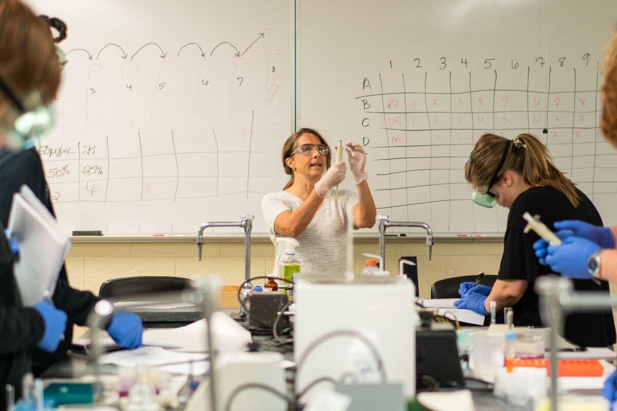 Photo of Dr. Gibson in an S3 lab course