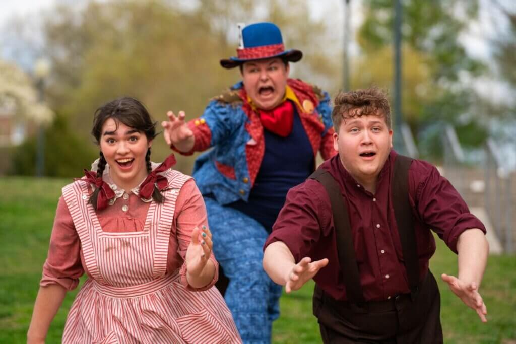 Photo of three MC Theatre students rehearsing a scene from "Revolt of the Beavers"