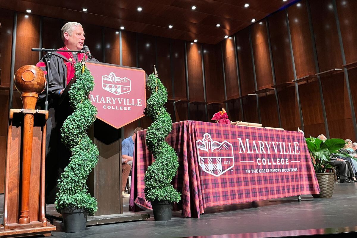 Photo of Dr. Bryan Coker at the lectern for the 2022-23 Academic Awards