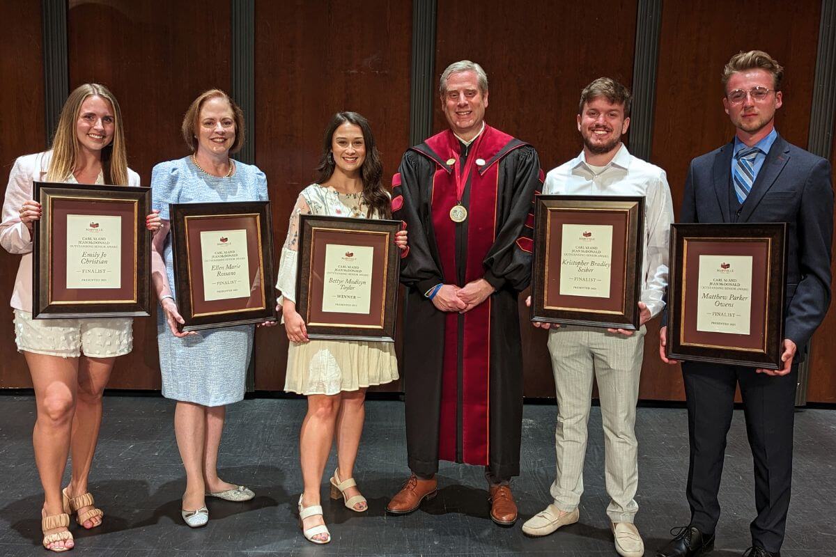 Photo of Dr. Bryan Coker with the finalists for the 2022-23 Outstanding Senior Award.