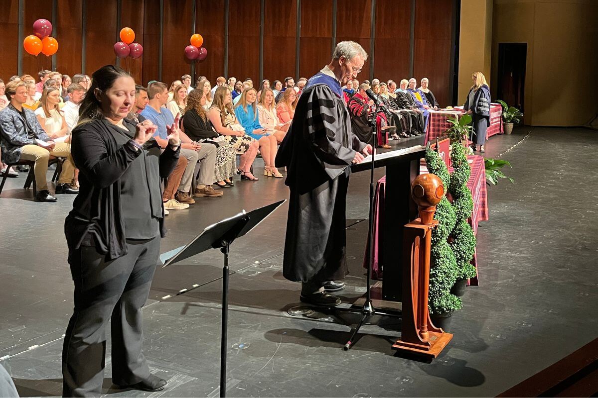 Photo of Dr. Dan Klingensmith at the lectern during the 2022-23 Academic Awards ceremony.