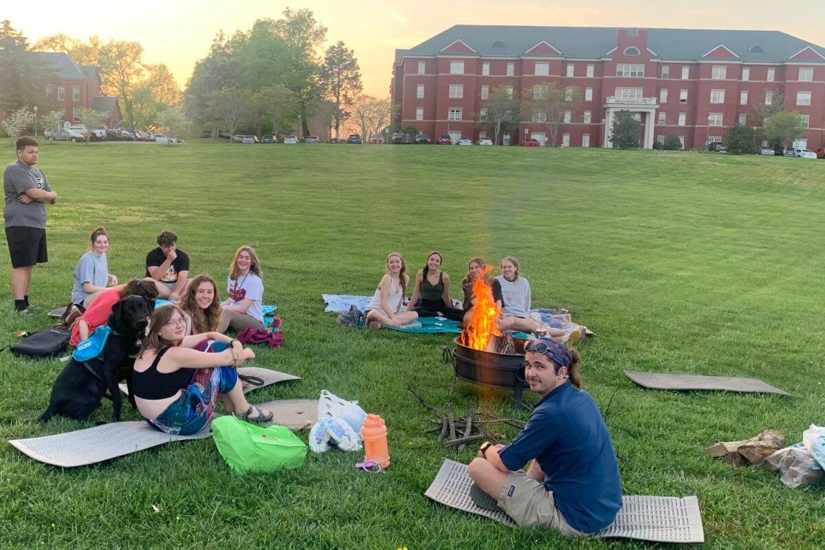 Photo of MC students on Lloyd Beach for the 2022 Dark Sky Party, part of 'Earth Week @ MC' activities that will take place again in 2023