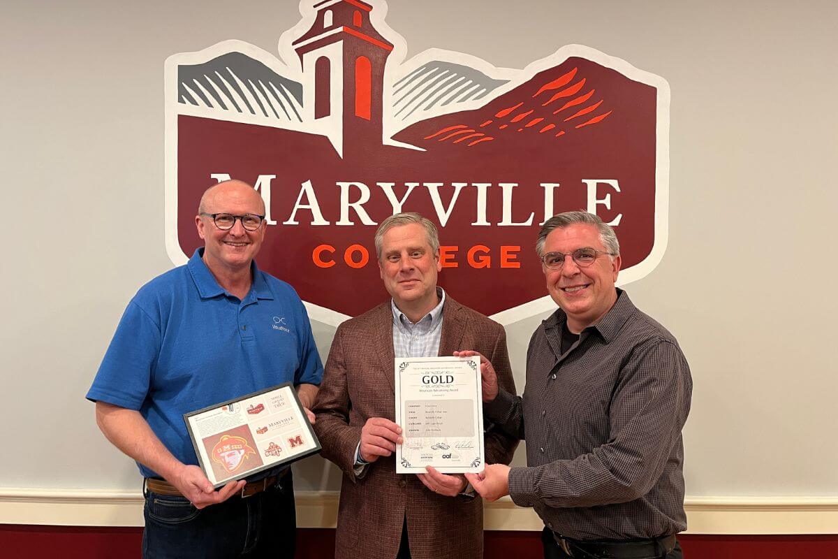 Photo of representatives of Visual Voice with MC President Dr. Bryan Coker