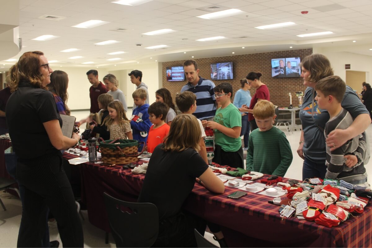 Photo of Crow at a table