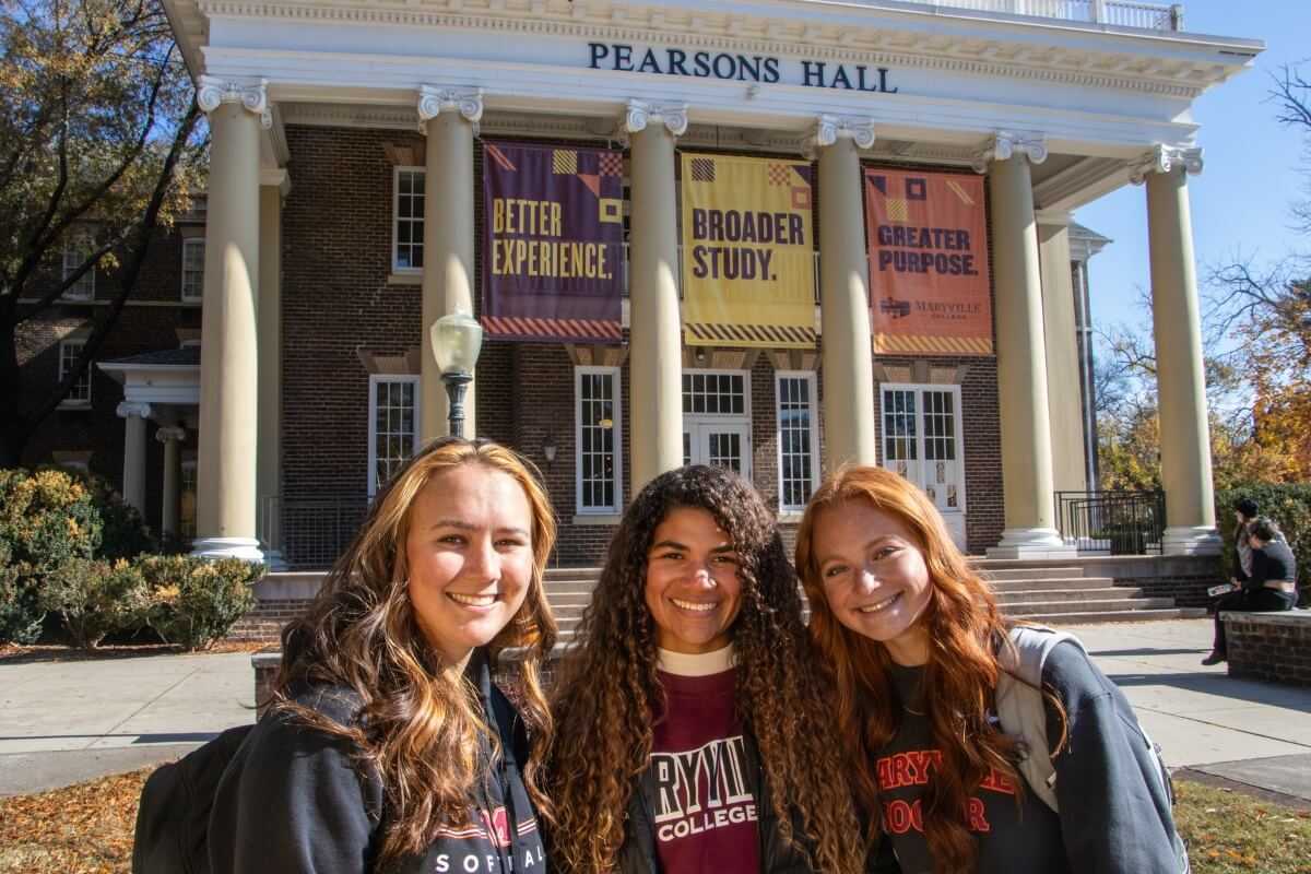 Photo of students recruited by MC Admissions standing in front of Pearsons Hall