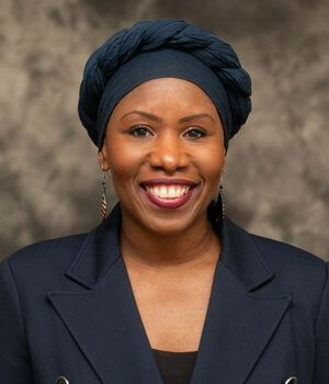 Photo of Ja'Wanda Grant against a studio background