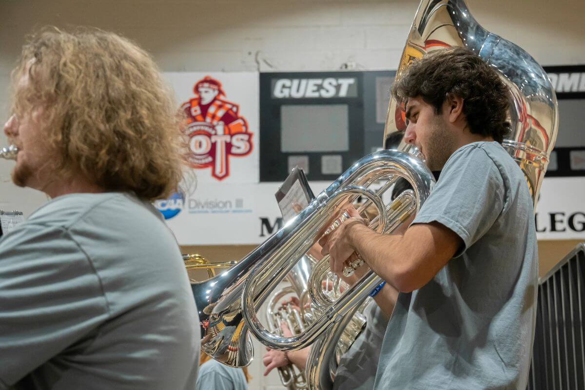 Photo of pep band members playing instruments