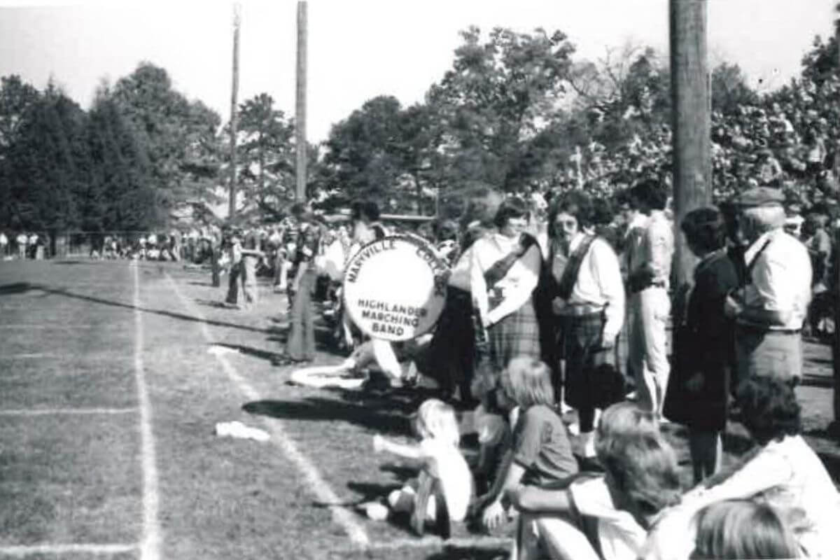 Black and white photo of the MC Highlander Band