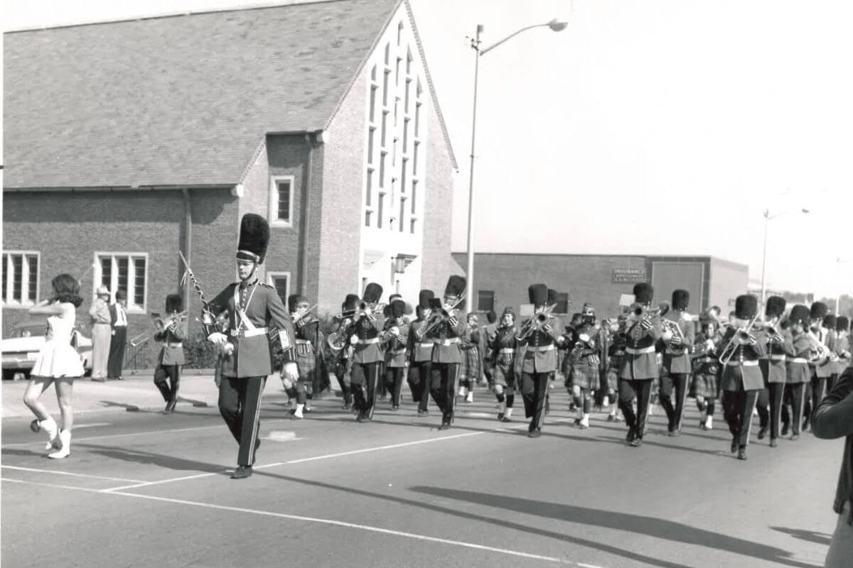 Photo of the Highlander Band marching in 1967
