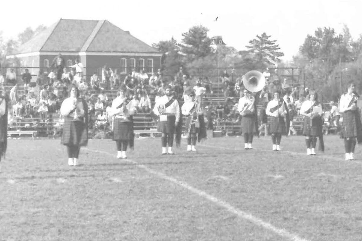 Faded black and white photo of the MC Highlander Band