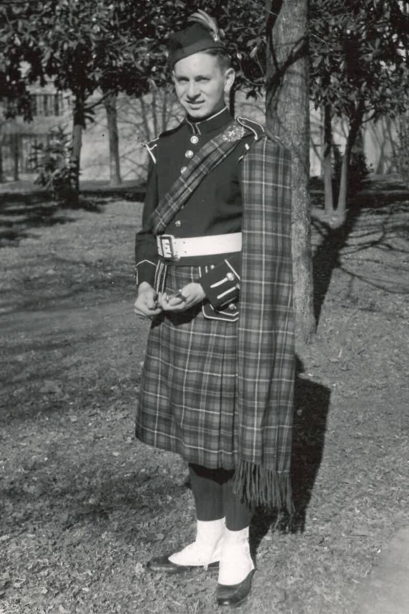 Photo of Bill Pennock '59 in his MC Highlander Band uniform.