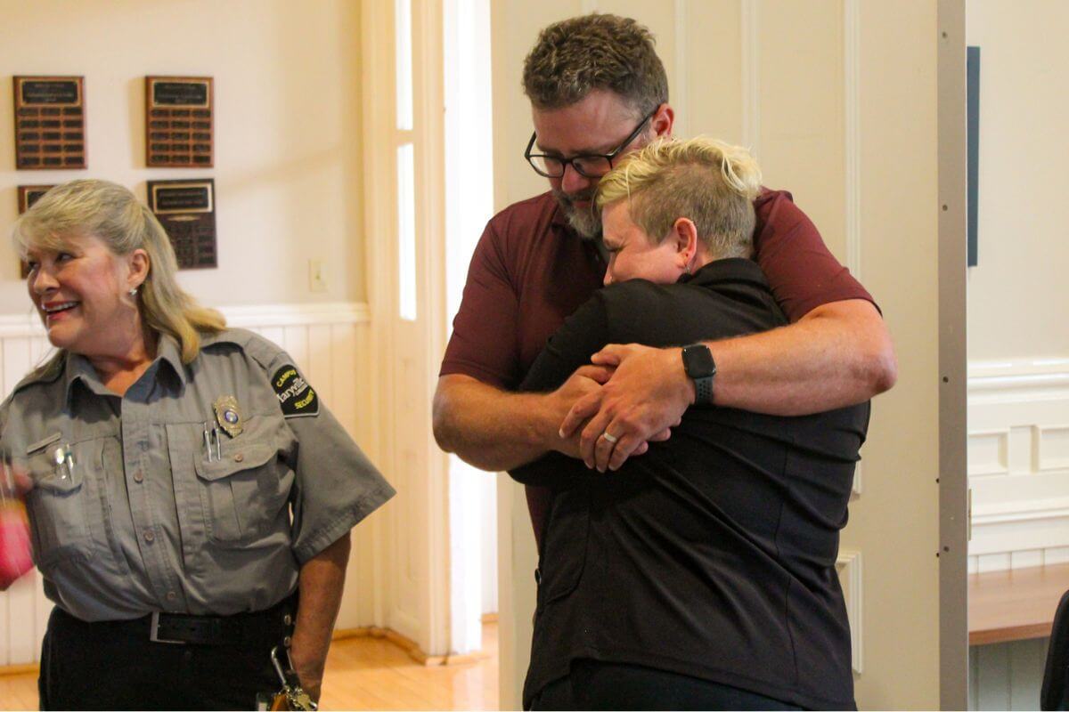 Photo of Sarah Yeaple hugging Brad Reagan