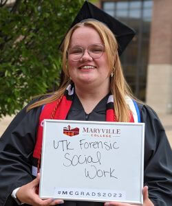 Photo of Eden Hensley in cap and gown at MC Commencement 2023