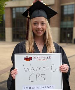 Photo of Laura Grace Russell in cap and gown at MC Commencement 2023