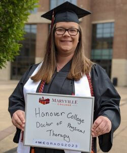 Photo of Robin Bannow in cap and gown at Commencement 2023