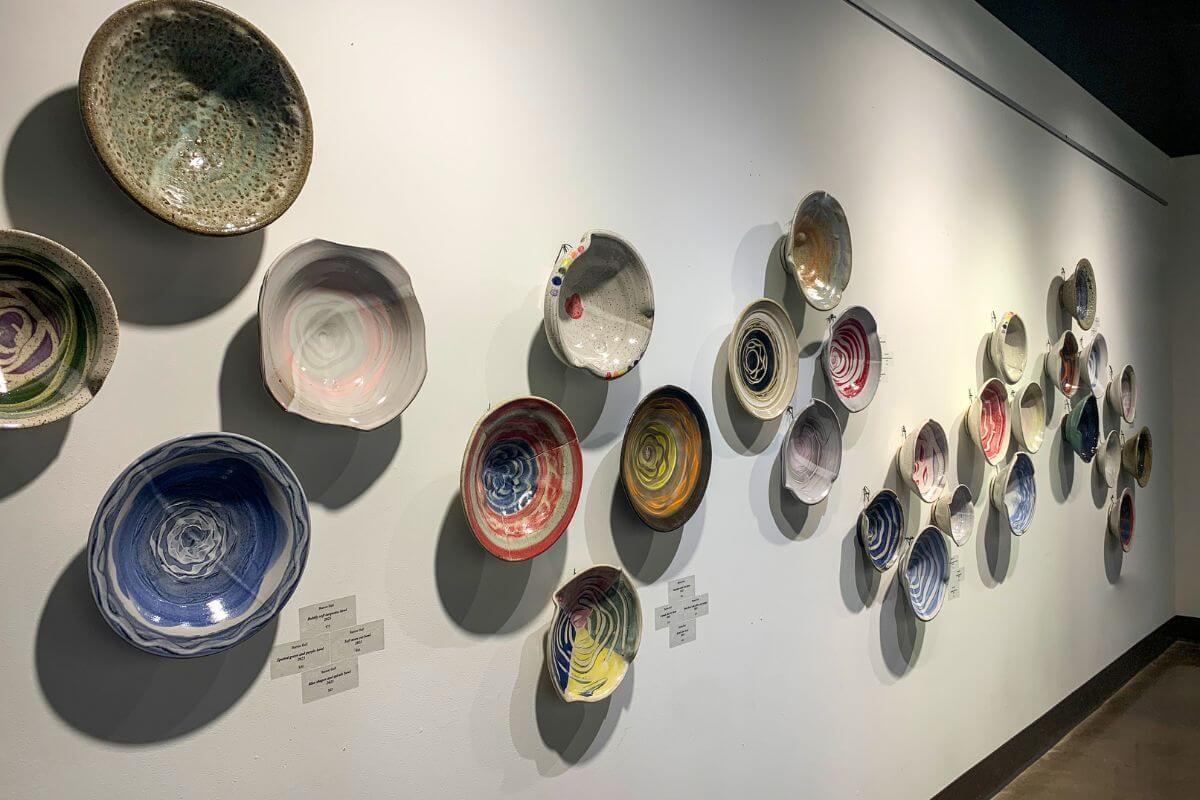 Photo of bowls hanging on a wall
