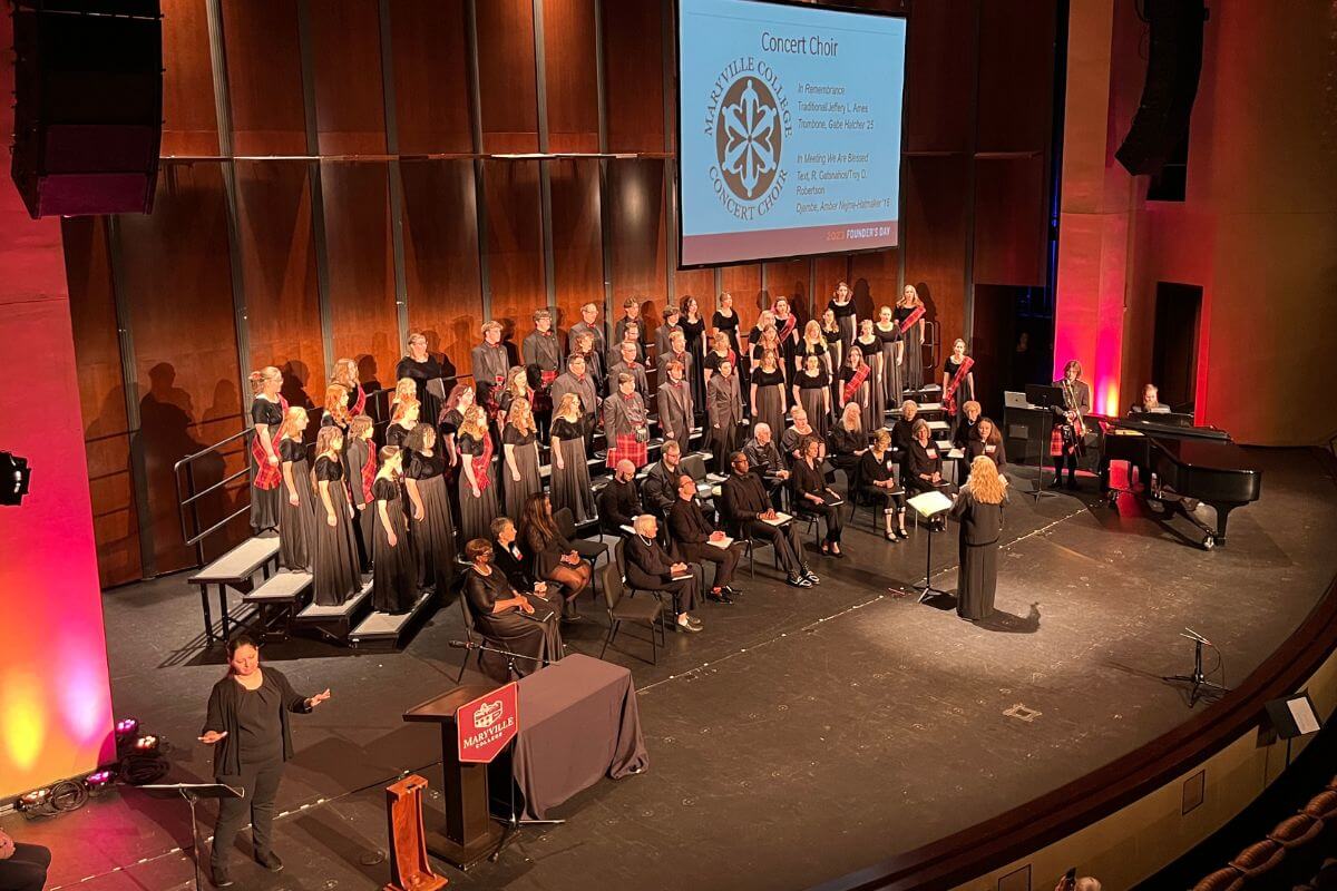 Photo of Maryville College Concert Choir performing on the Clayton Center stage.