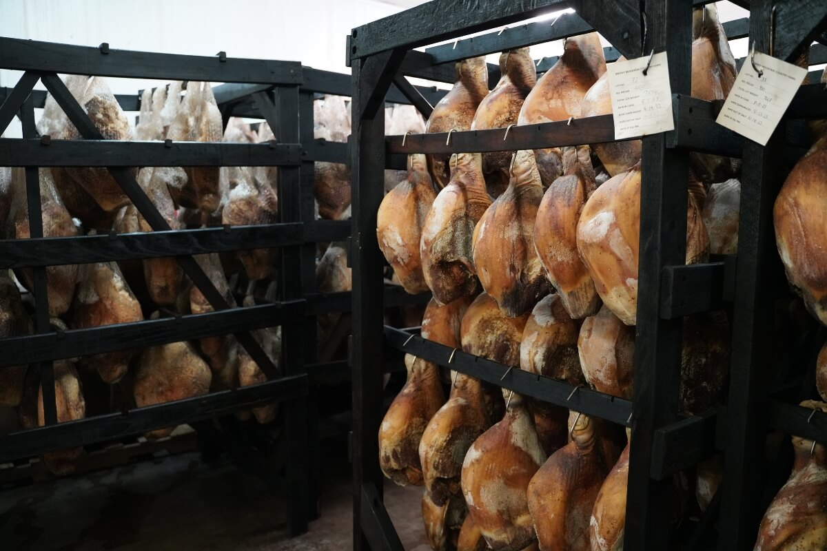 Photo of country ham hanging to dry
