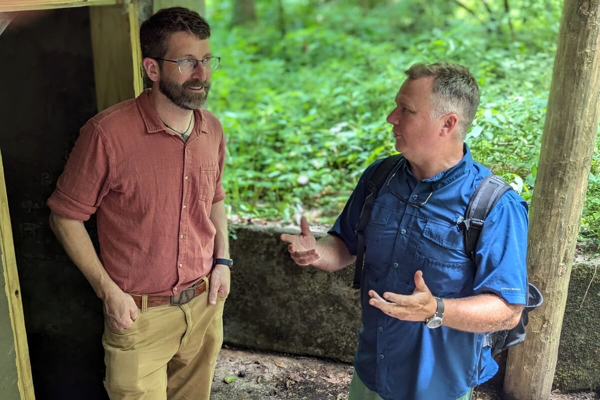 Photo of Ben Taylor listening to Dr. Drew Crain